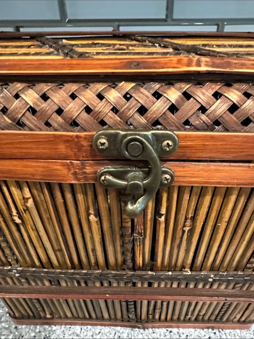Woven bamboo storage box. All bamboo with metal latch closure.